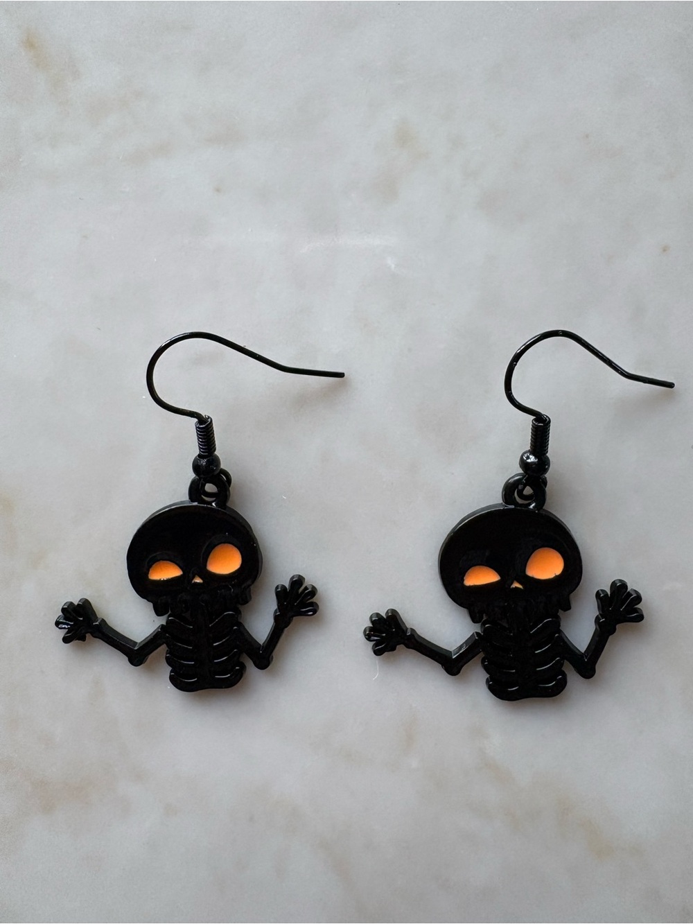 Black Skeleton Kids Earrings with Orange Eye Accents